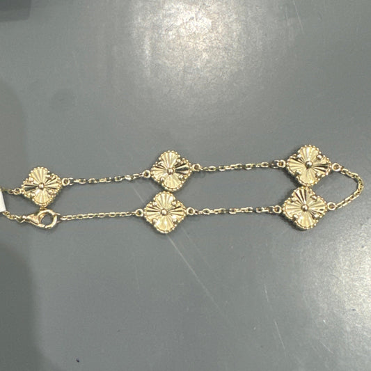 10K Yellow Gold Clover bracelet diamond cut